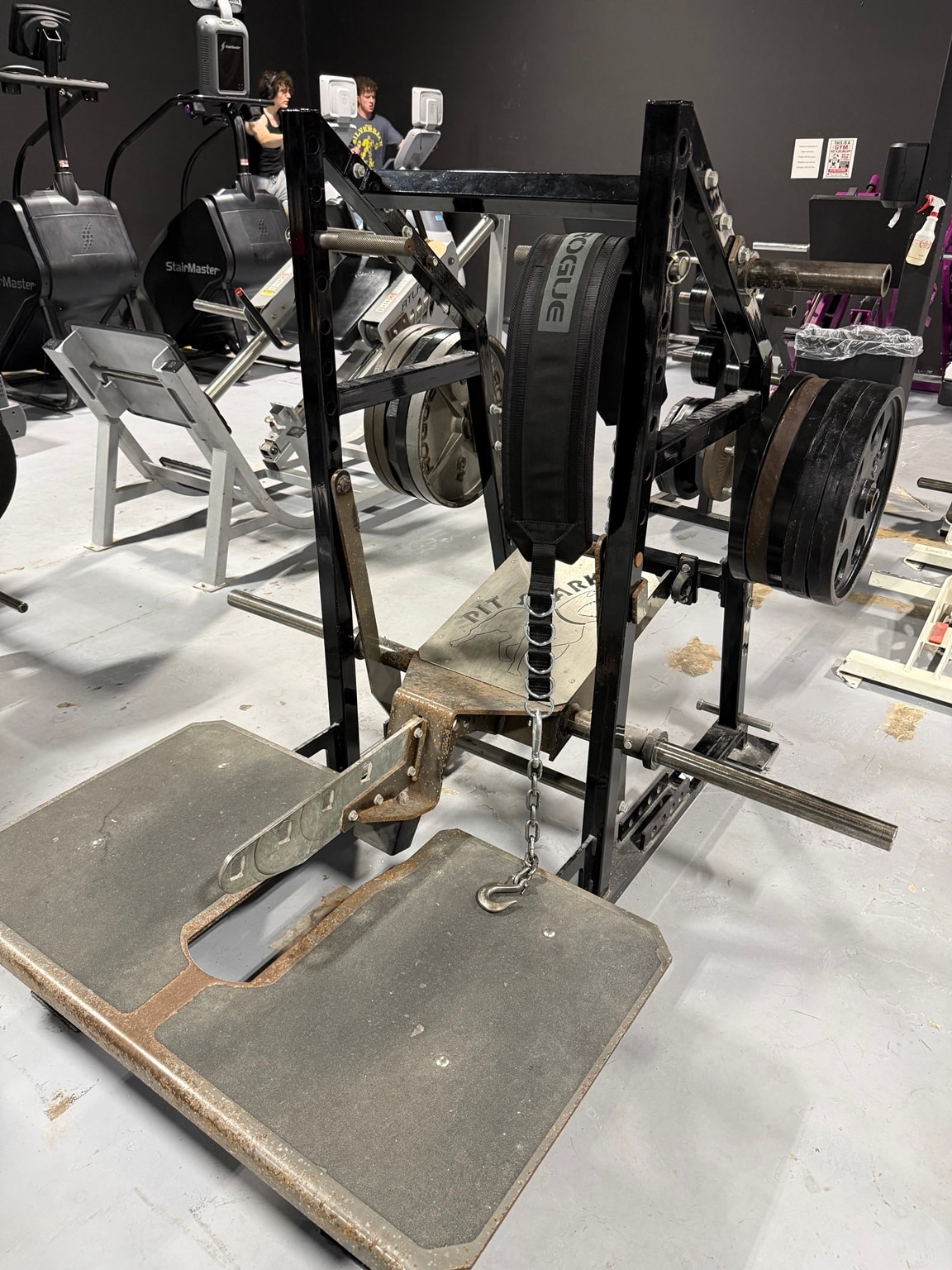 Cardio and weight machines at Full Tilt Barbell Club