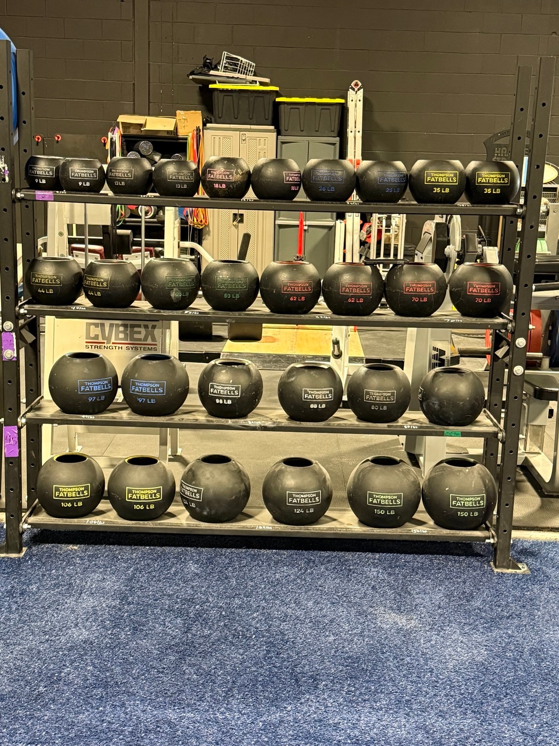 Heavy dumbbells at Full Tilt Barbell Club
